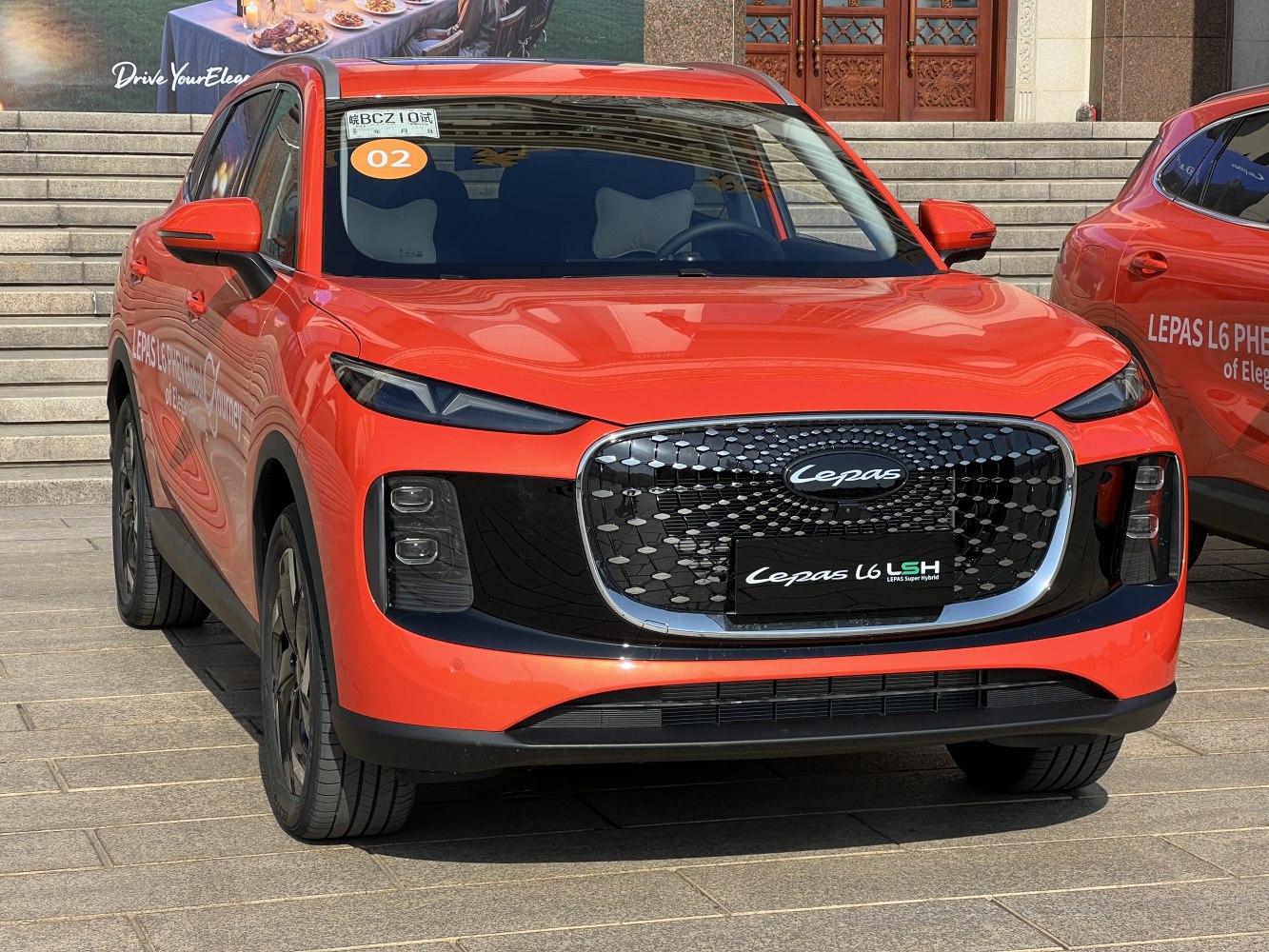 Distinctive front grille and sleek LED headlights of a modern hybrid SUV