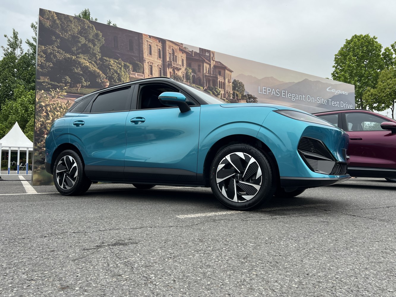 Aerodynamic electric crossover with futuristic alloy wheels