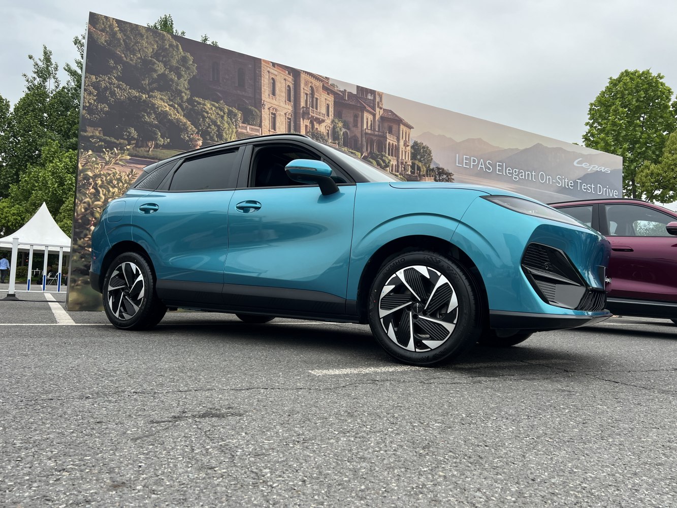 Sleek modern electric SUV with aerodynamic wheels