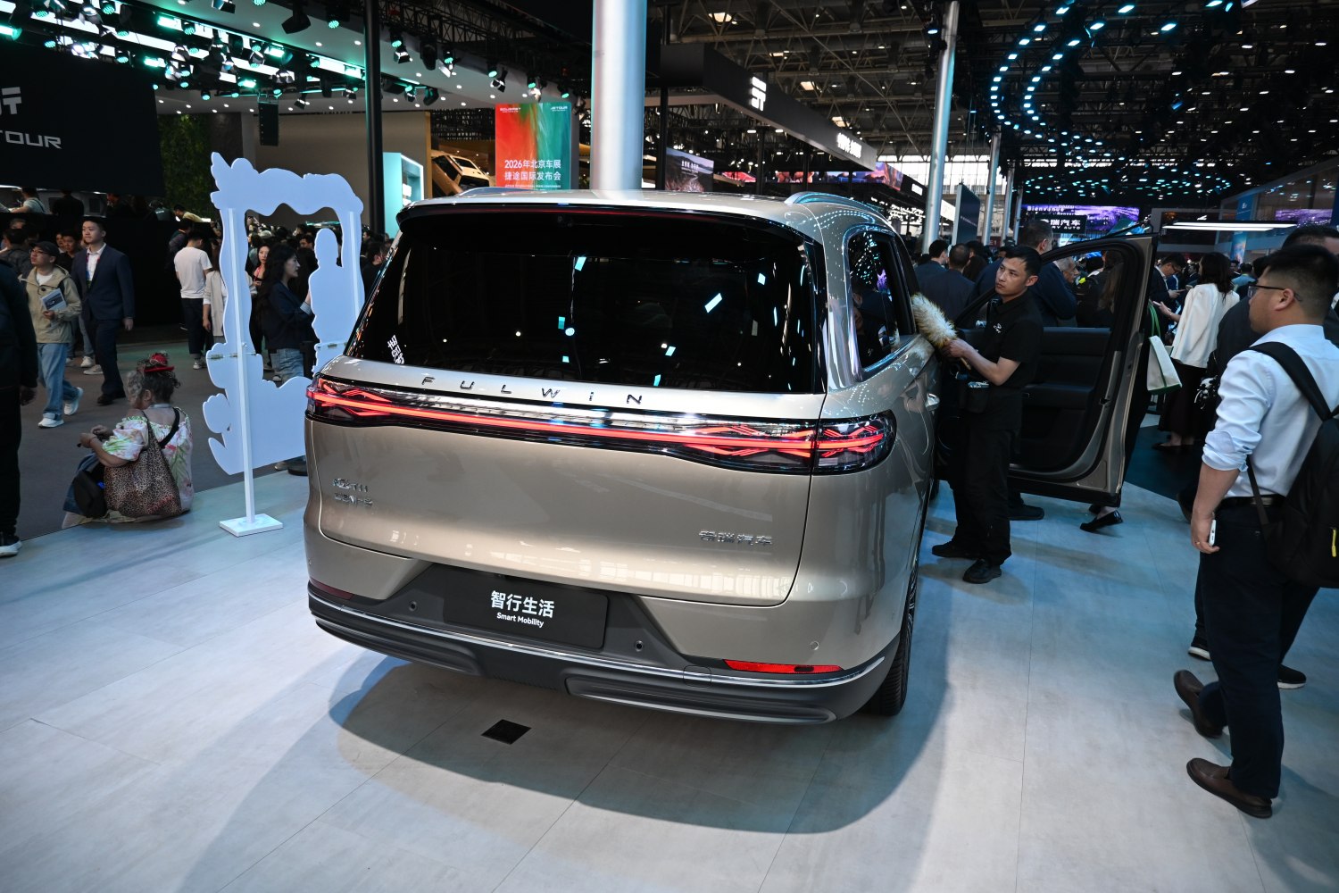 Rear view showcasing LED tail light strip and large rear window