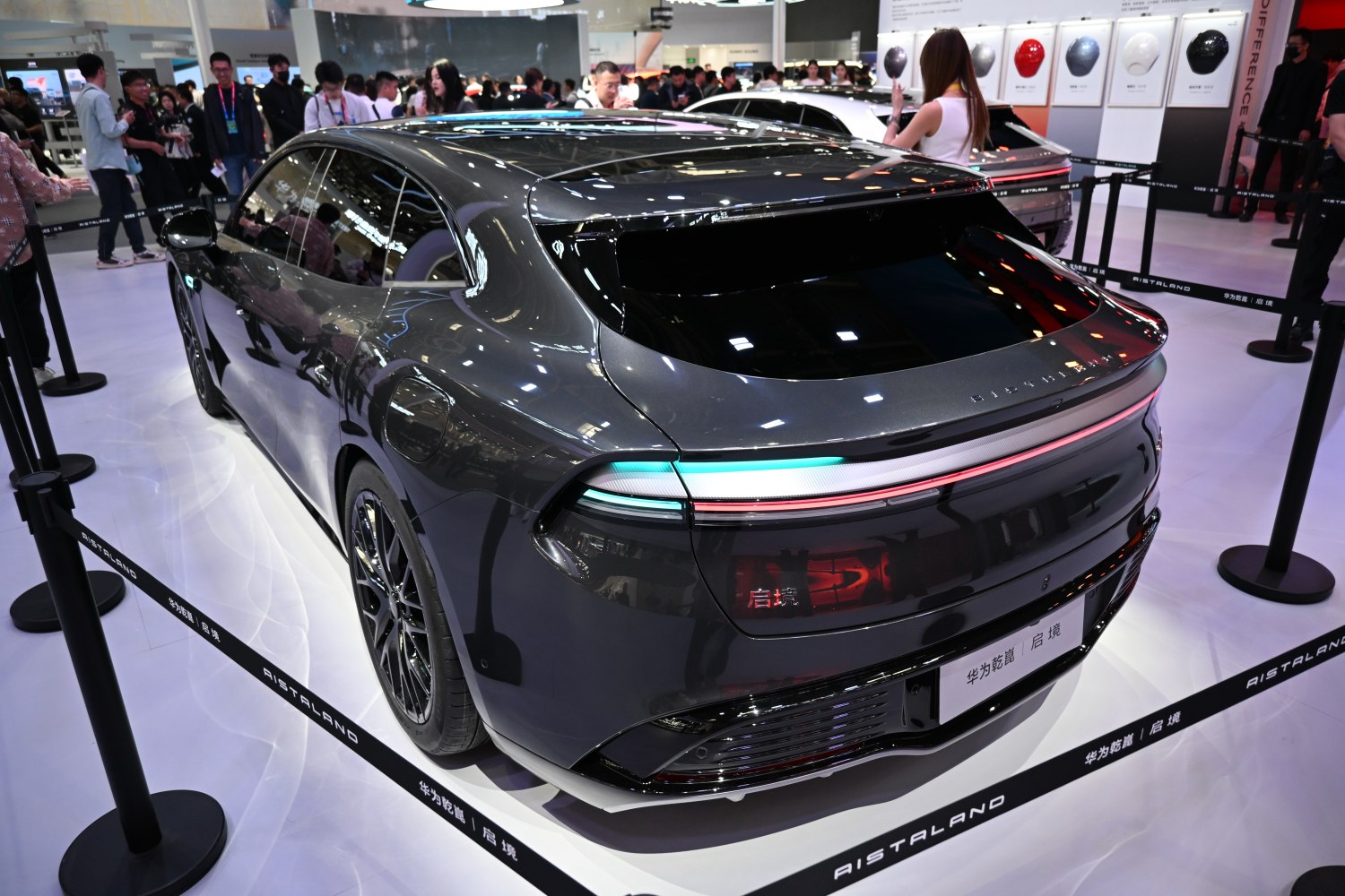 Rear view of sleek electric hatchback with panoramic roof and modern taillights