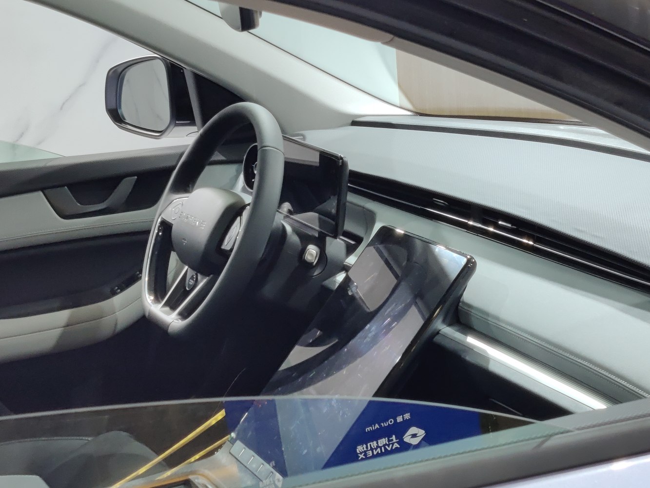 Dual digital displays and modern dashboard in car interior