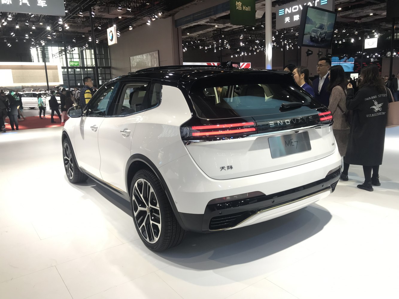 Rear view of a white SUV with LED light bar and sporty wheels