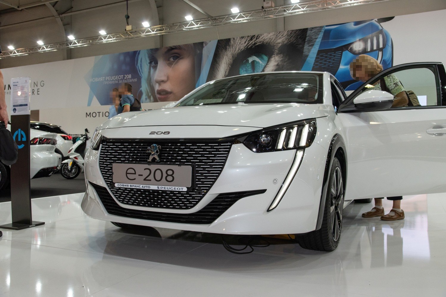 Front grille with LED headlights on white vehicle