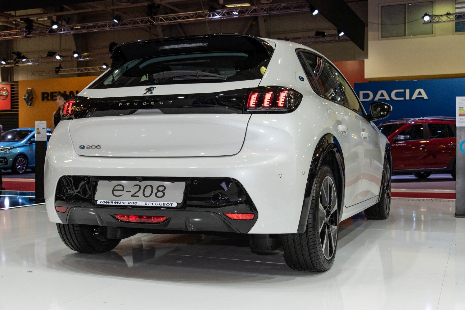 Rear electric hatchback with distinctive tail lights and black trim