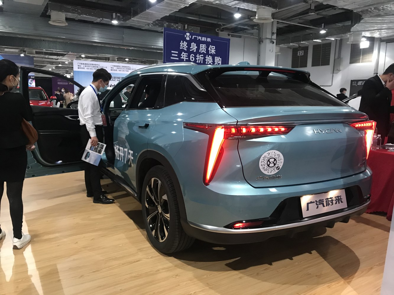 Rear view of a vehicle with Y-shaped LED taillights and sleek aerodynamic design