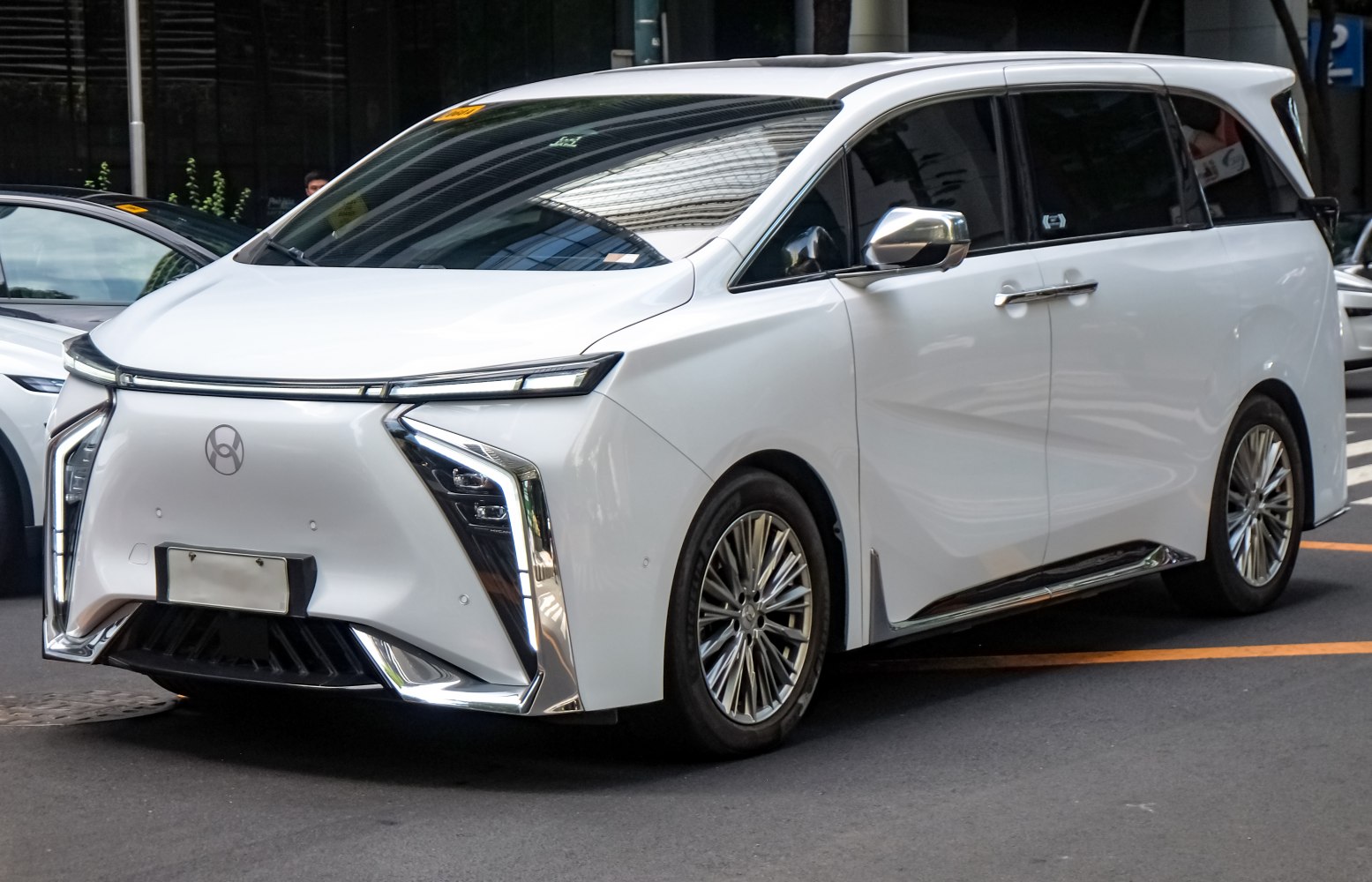 Electric MPV with angular LED lights and aerodynamic design