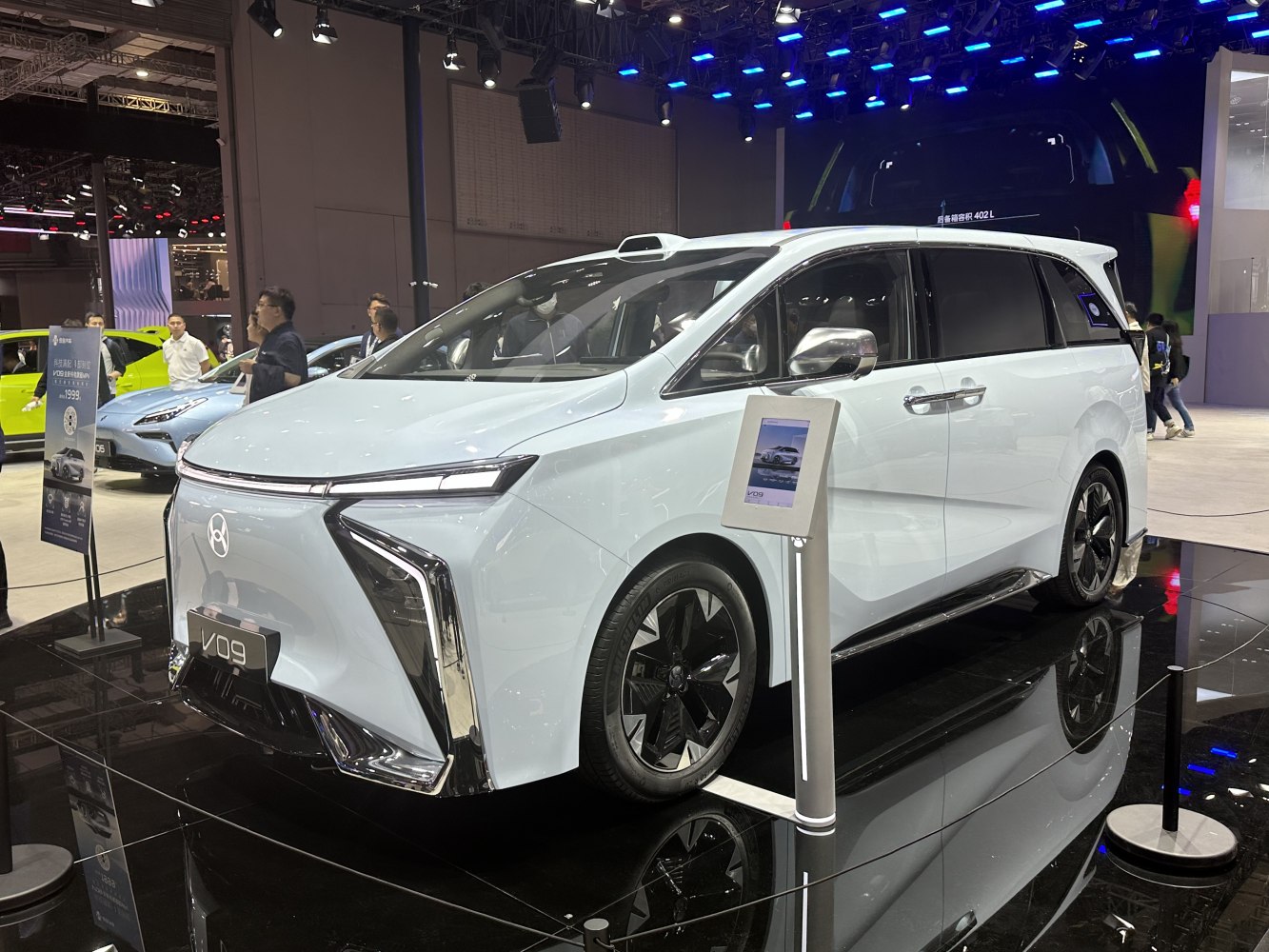 Futuristic electric MPV with LED lights and aerodynamic shape