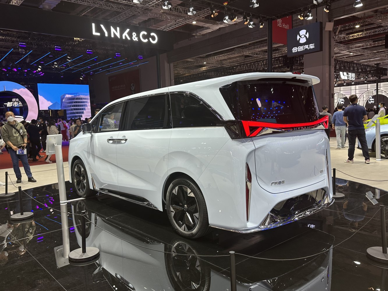 White MPV with futuristic rear lights and black rear window