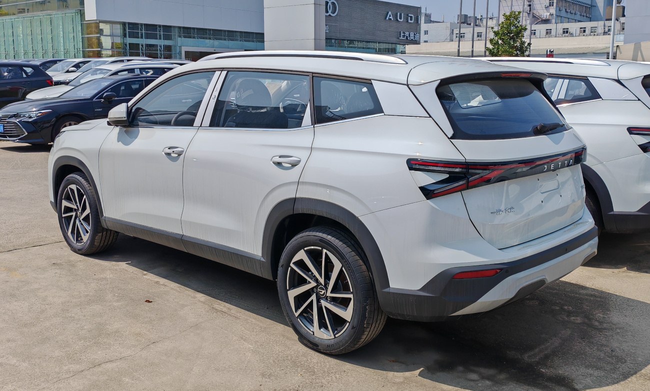 SUV rear side with sleek taillights and modern alloy wheels