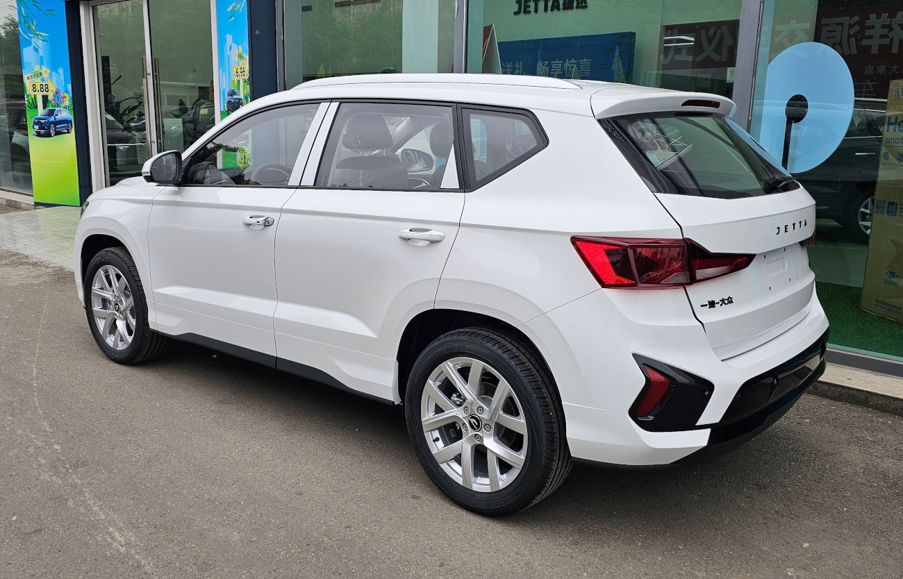 Rear side view of 2024 facelift SUV with alloy wheels and sharp taillights