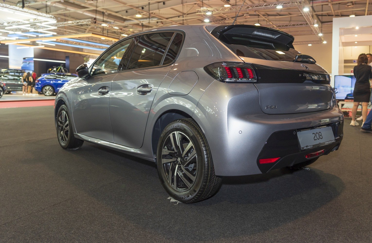 Rear side view with modern multi-bar tail lights and alloy wheels