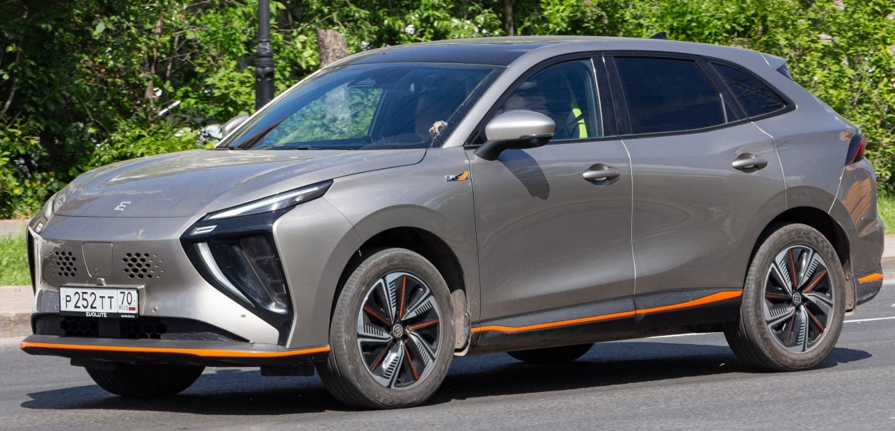 Front and side view of sleek modern SUV with distinctive lighting