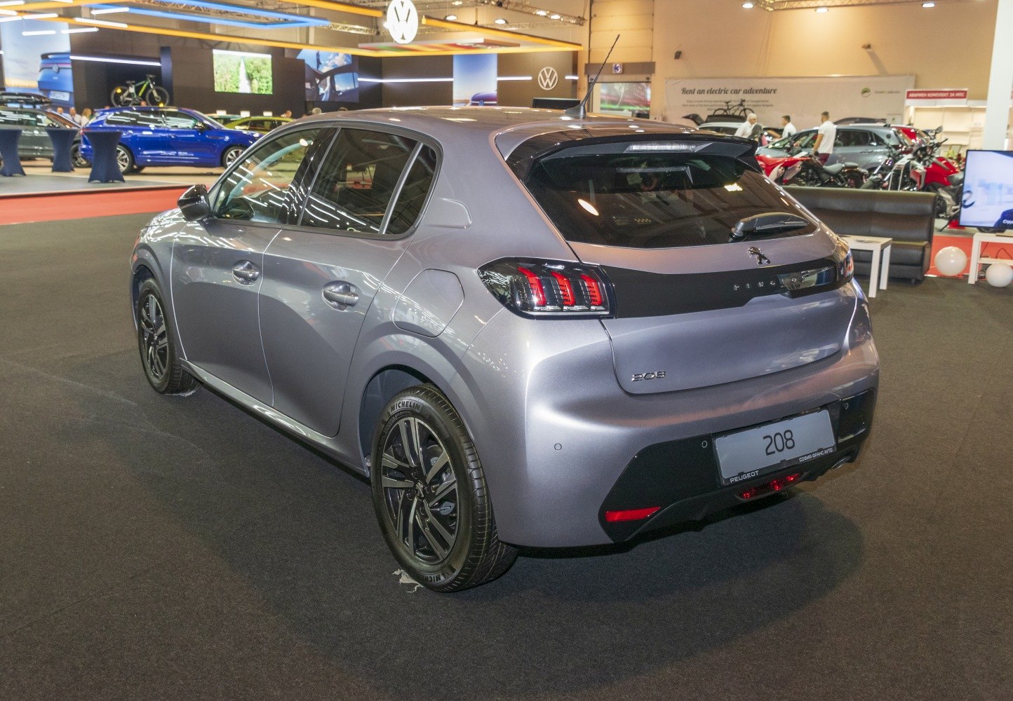 Rear and side view of hatchback with distinctive taillights and black alloy wheels