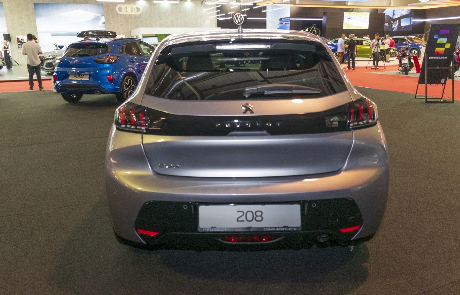 Rear view of hatchback with distinct tail lights and smooth bumper