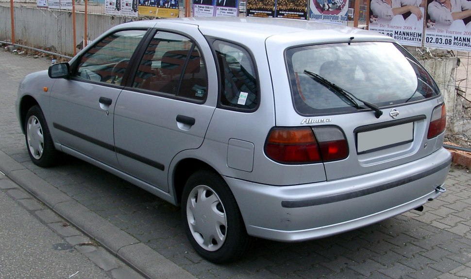 Hatchback rear and side view with taillights and rear windshield wiper