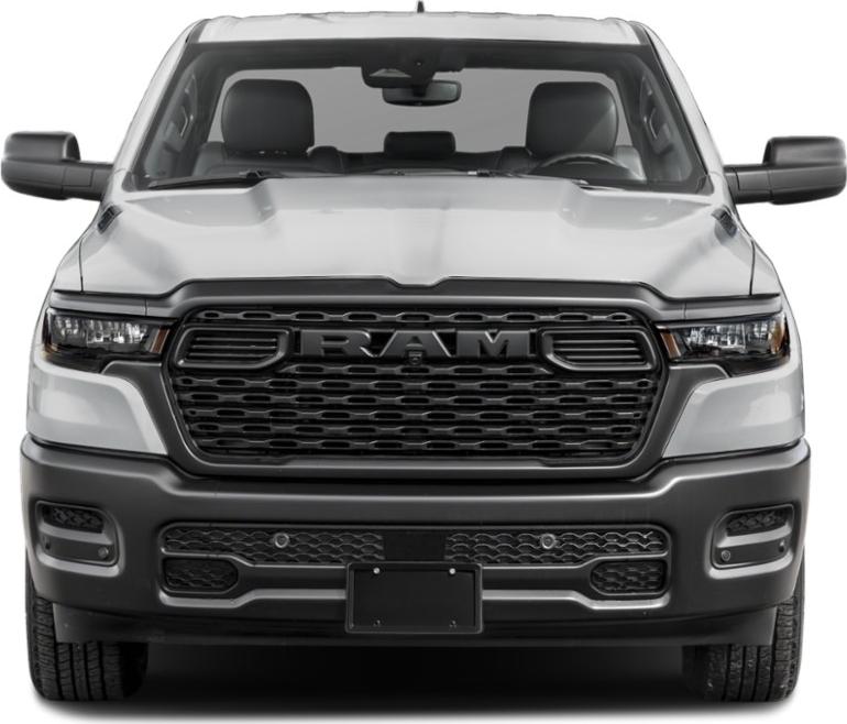 Front view of a pickup with bold grille and LED headlights.