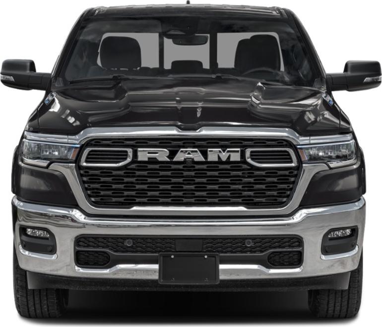 Front view of a pickup truck with bold grille and headlights
