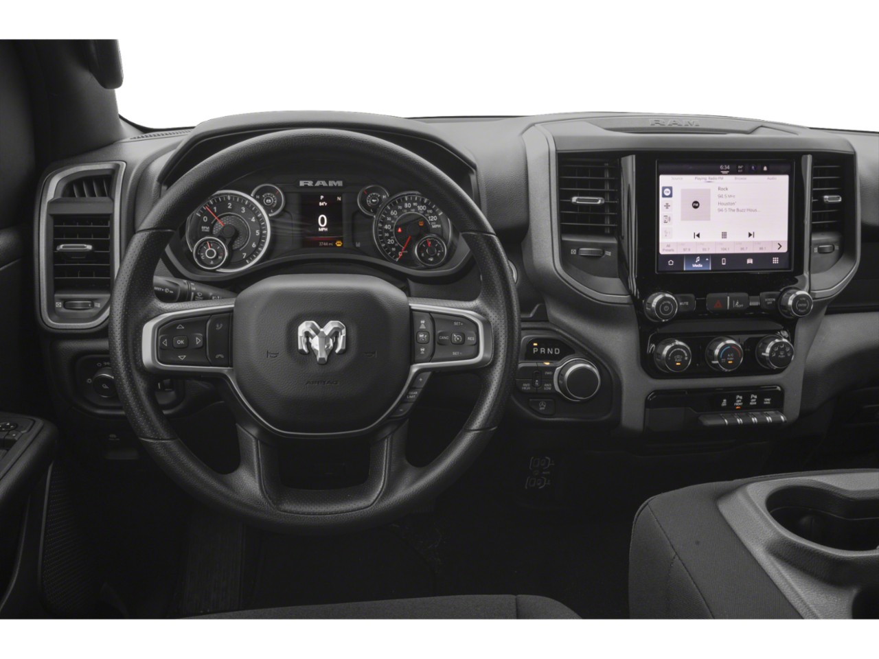 Steering wheel, gauge cluster, and touchscreen infotainment system