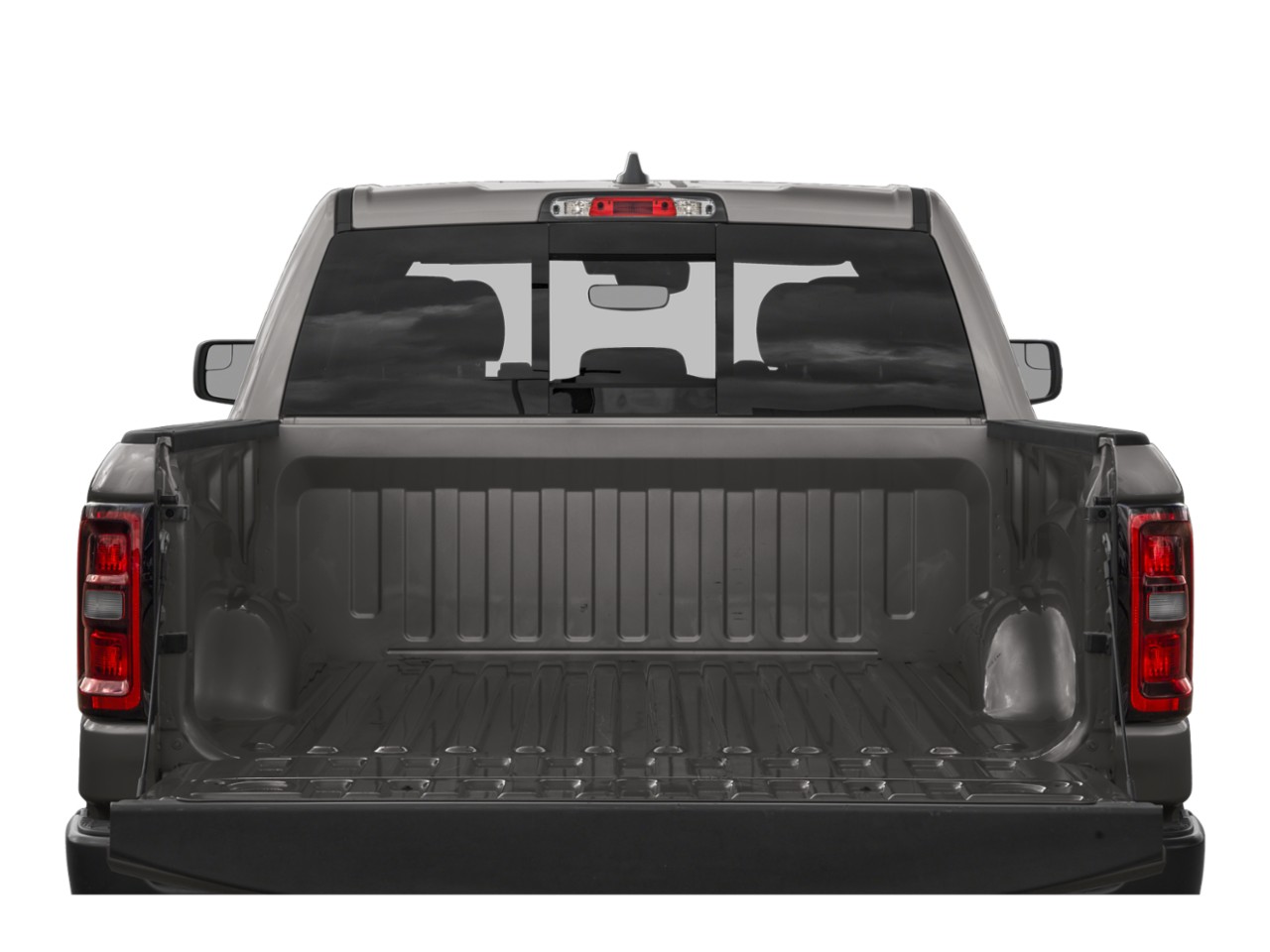 Open pickup truck bed with tailgate down and rear window view