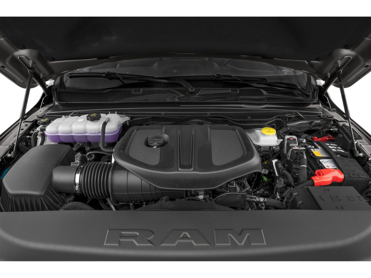 Detailed engine bay with plastic engine cover and fluid reservoirs