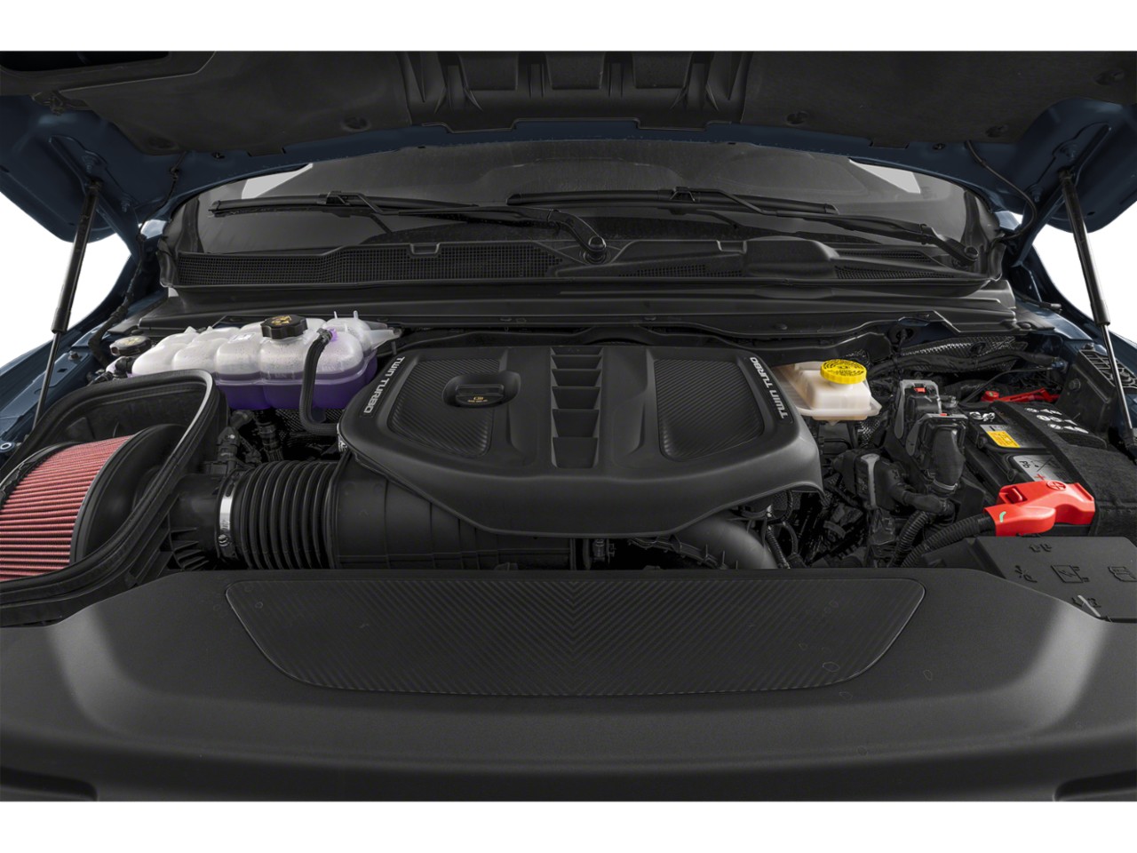 Twin turbo engine bay with air intake and fluid reservoirs