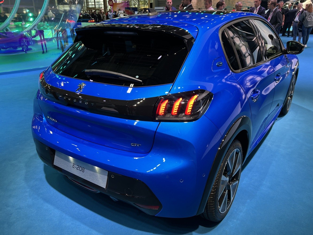 Blue hatchback rear with distinctive triple stripe LED taillights