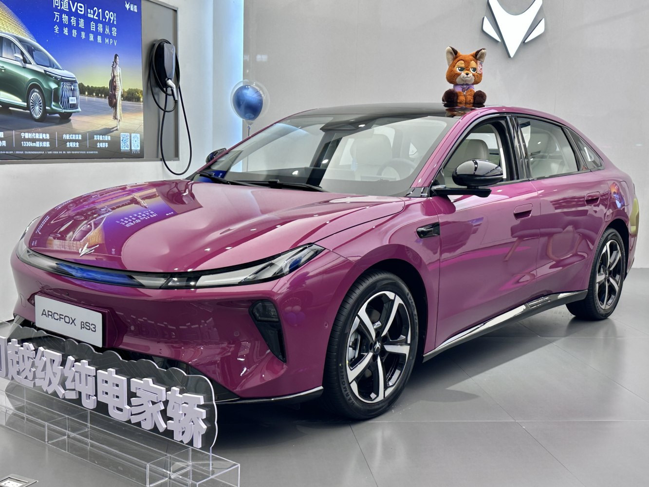Sleek electric sedan with streamlined body and futuristic LED headlights
