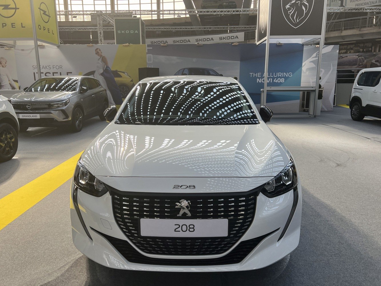 Close-up of modern front grille and angular LED headlights