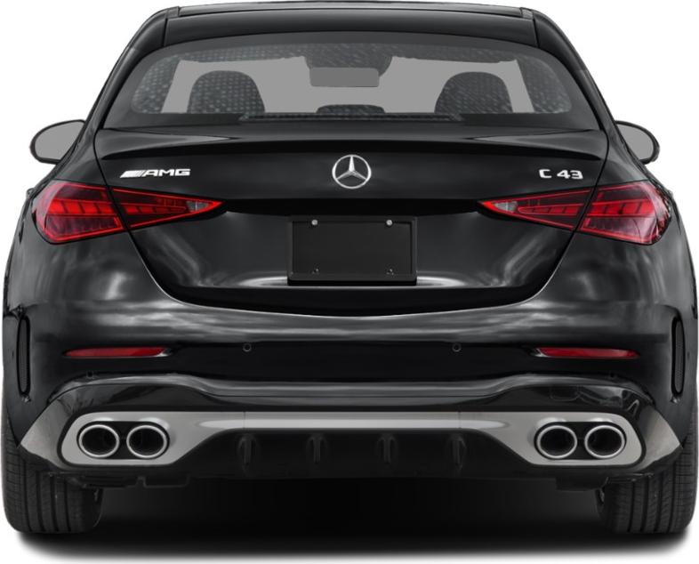 Rear view of sleek sporty sedan with AMG badge and quad exhausts