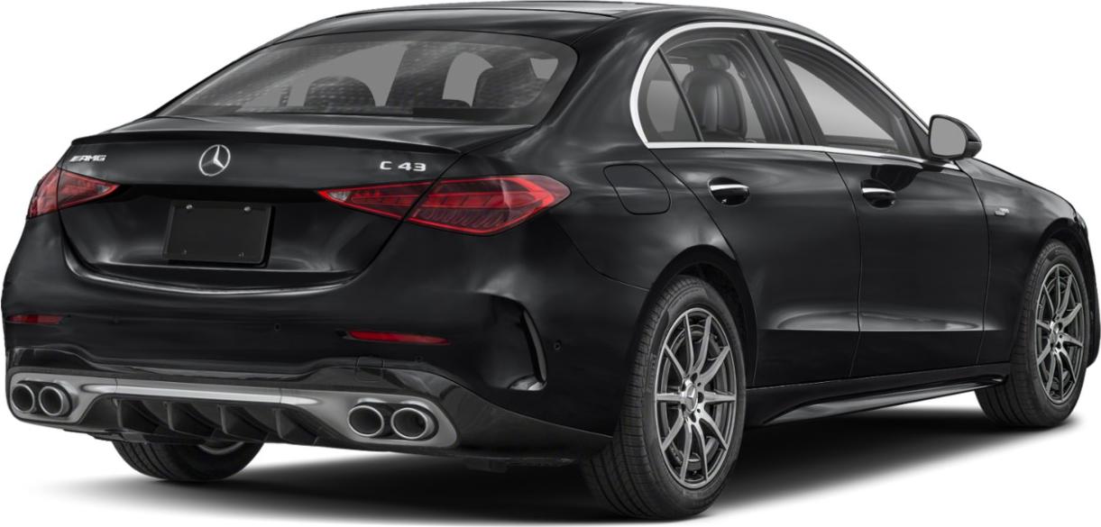 Rear view of a sporty sedan with quad exhaust pipes and sleek tail lights