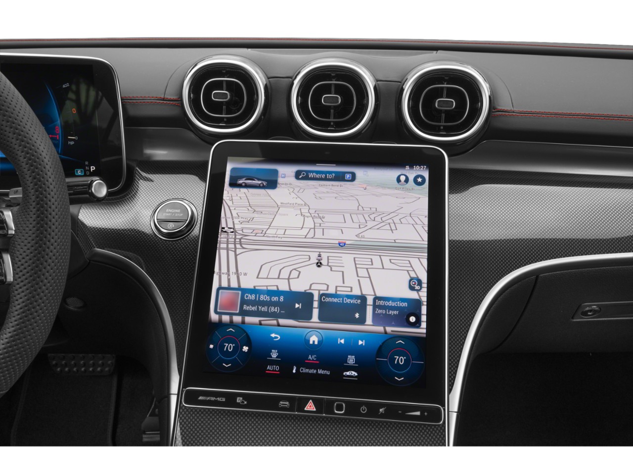 Large touchscreen display, circular air vents, modern dashboard design.