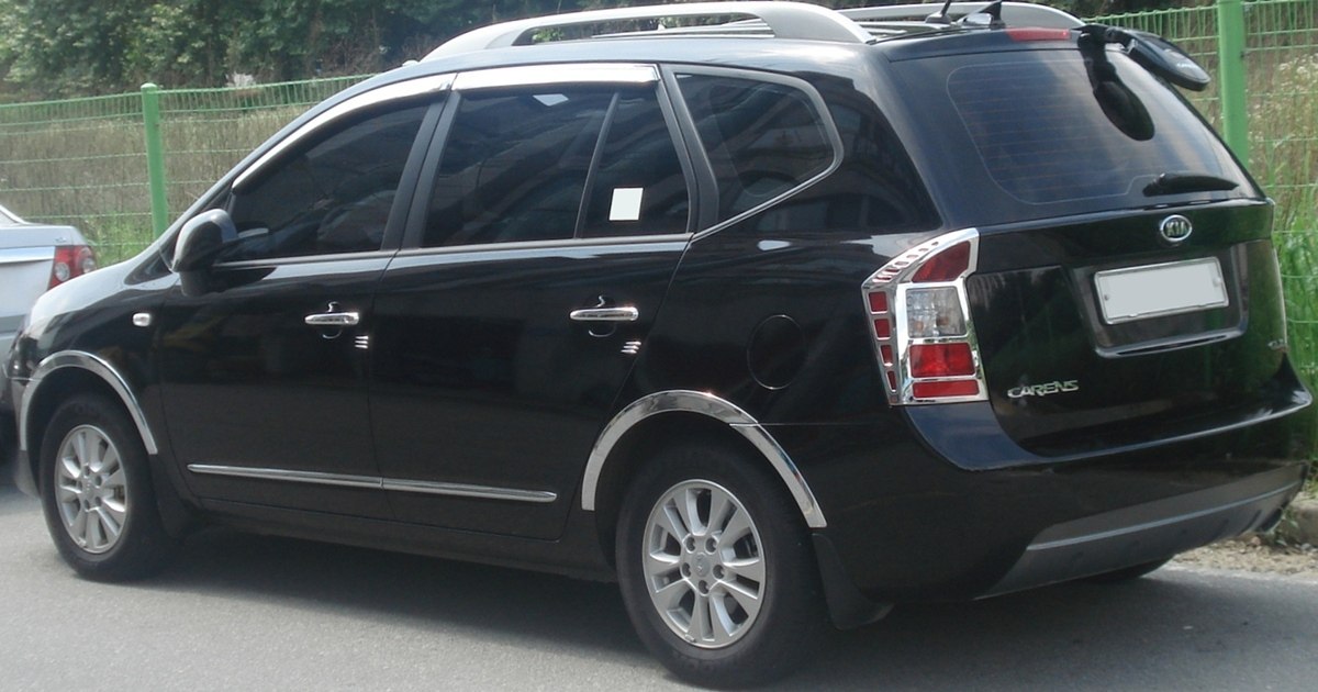 Rear and side profile with chrome trim and roof rails