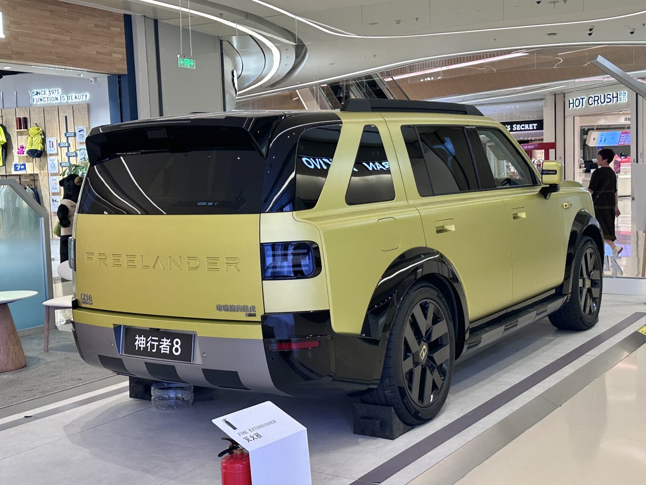 Two-tone SUV rear with blacked-out windows and modern tail lights