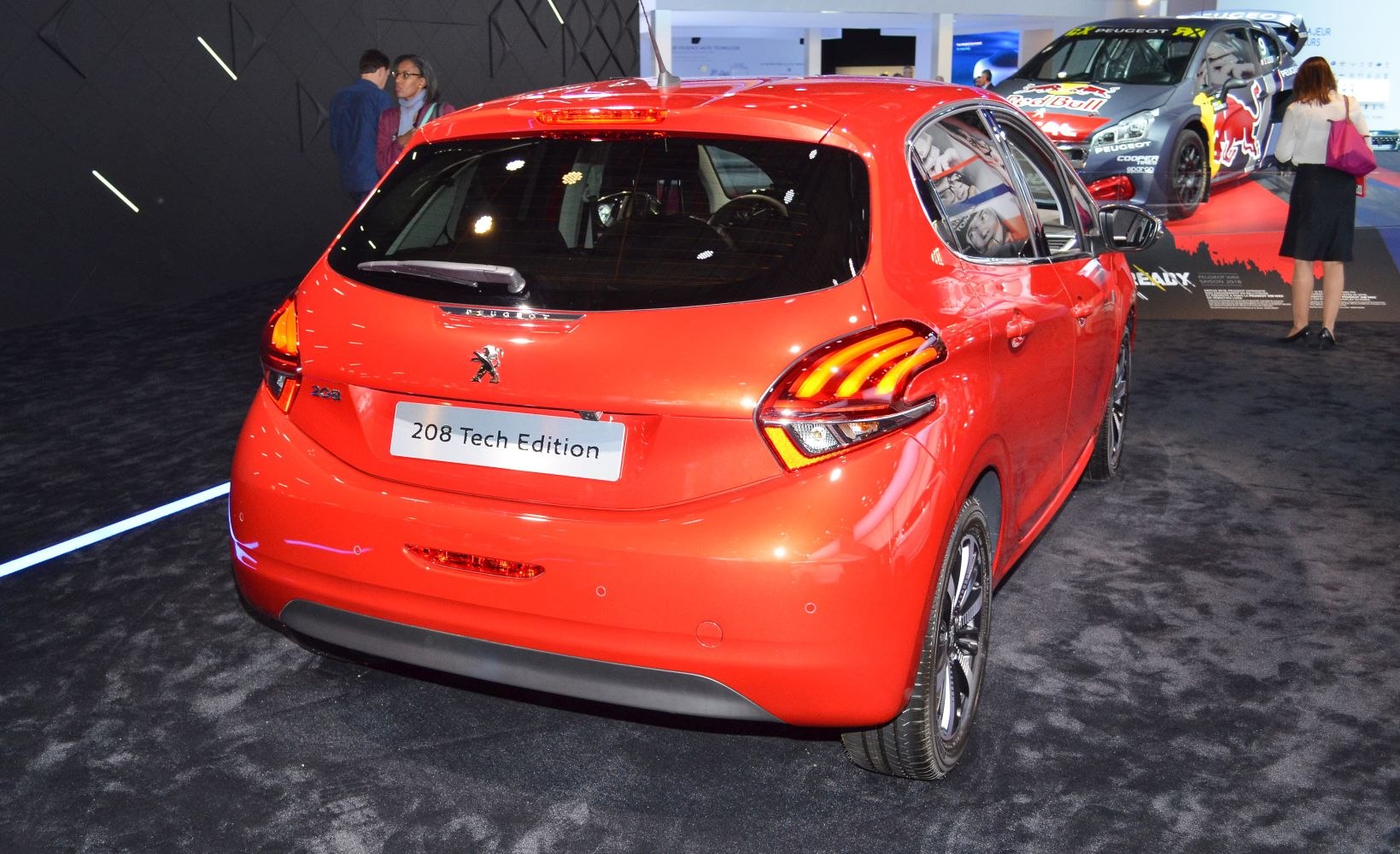 Rear view with illuminated taillights and Tech Edition badge