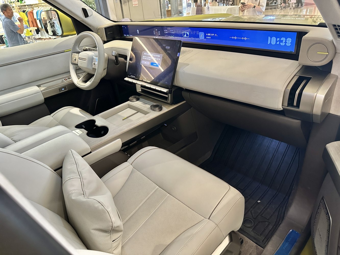 Panoramic digital dashboard and central touchscreen in luxury car interior