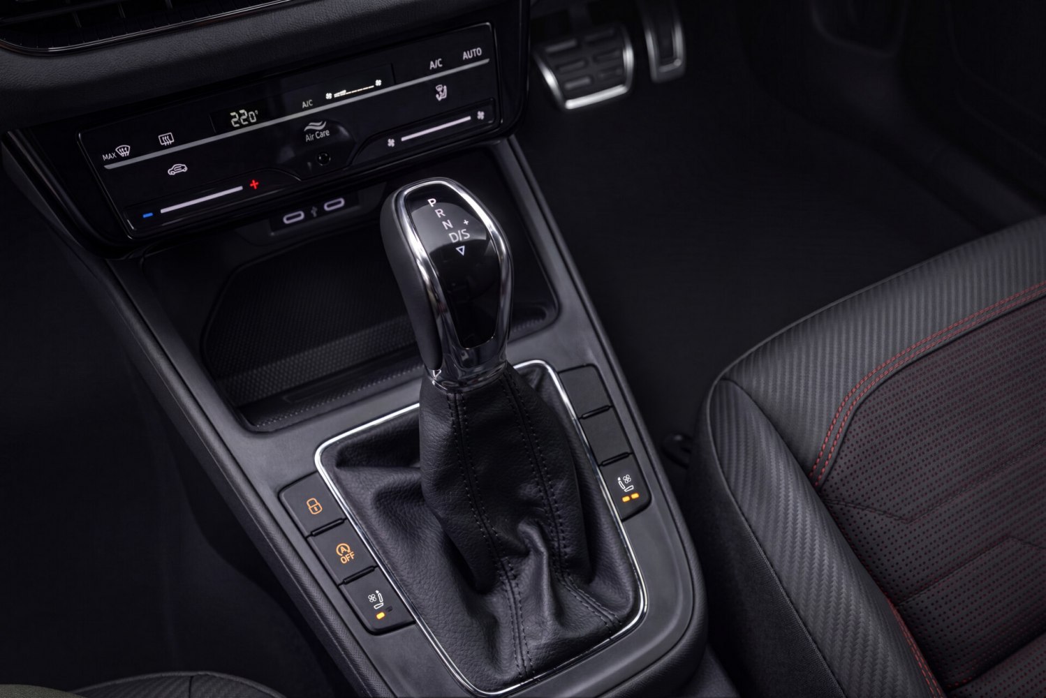 Automatic gear shifter with digital climate control panel and heated seat buttons