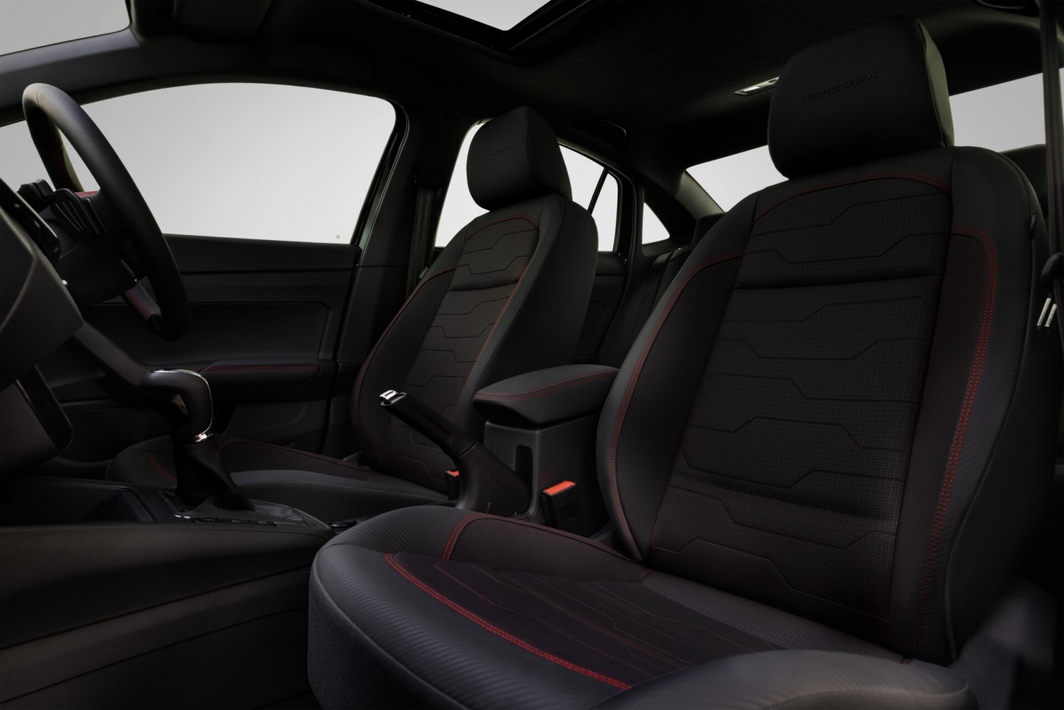 Sporty black seats with red stitching and ergonomic design in modern car interior