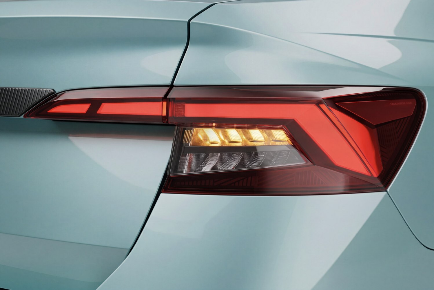 Sharp angular LED rear tail light with distinctive light pattern