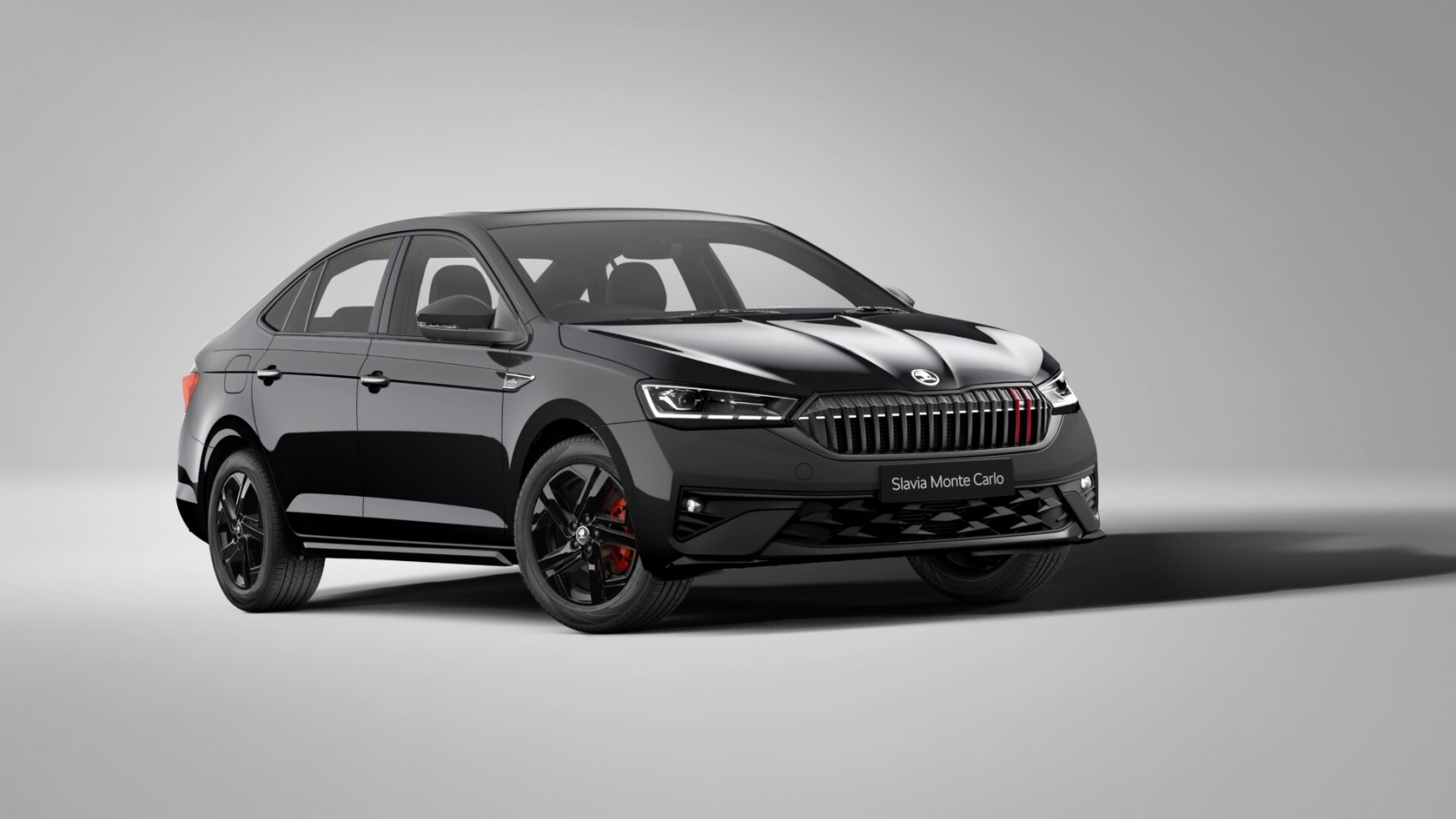 Black sedan with modern grille and alloy wheels