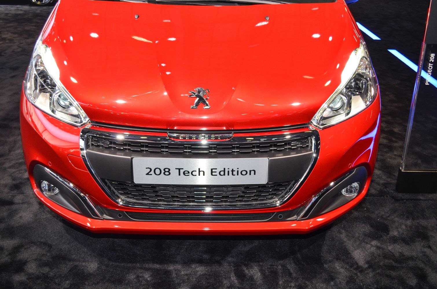 Close-up of front grille and headlights with chrome accents