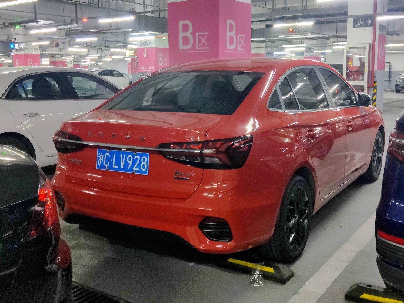 Rear view of sedan with distinctive sleek taillights and integrated rear bumper design