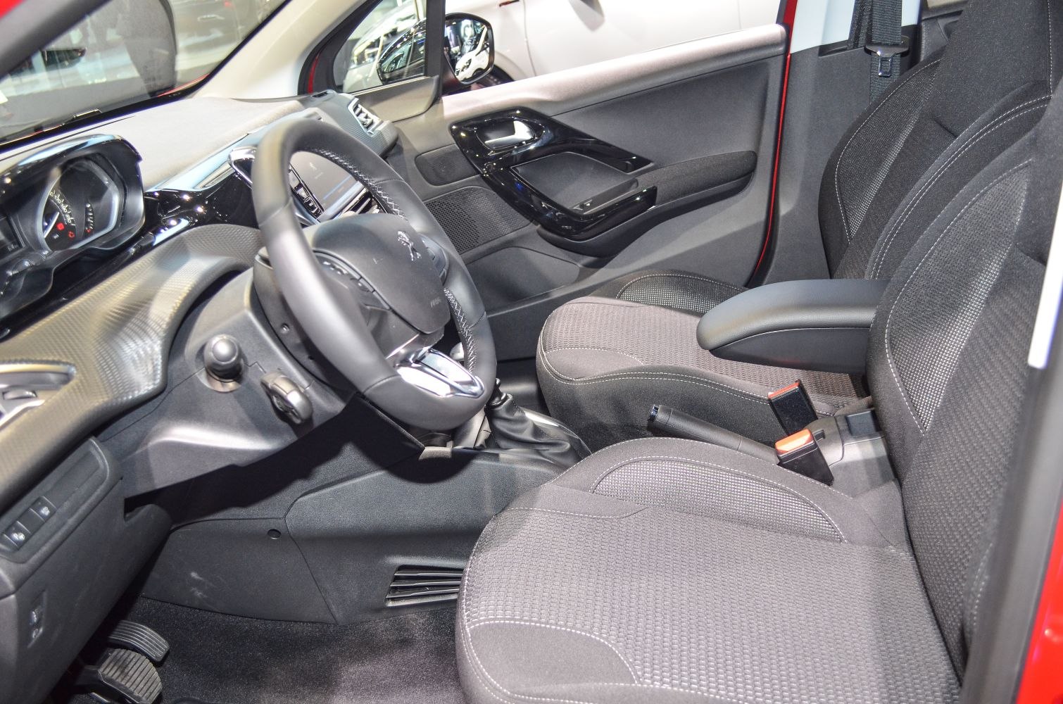 Dashboard, steering wheel, and front seats upholstery