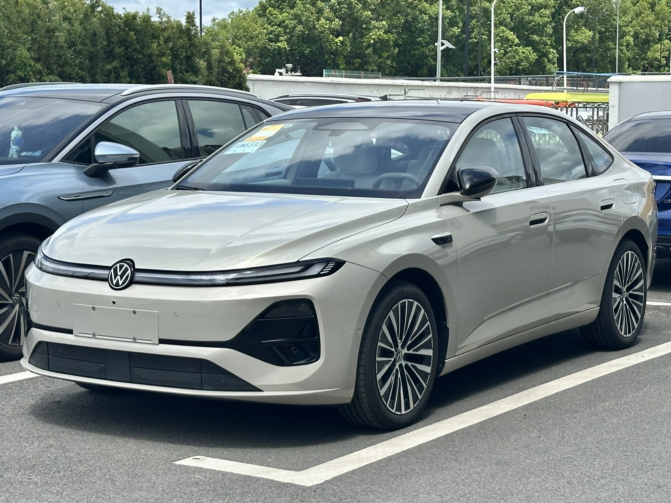 Sleek aerodynamic front with LED headlights and modern wheels