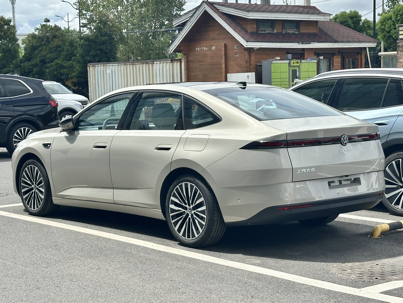 Rear and side profile of sleek electric sedan with aerodynamic design