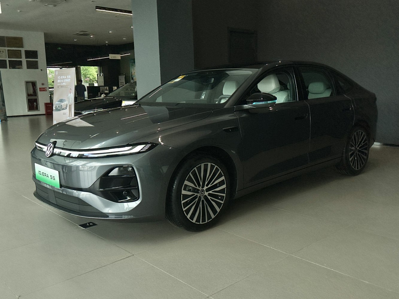 Electric sedan with LED headlights and modern alloy wheels