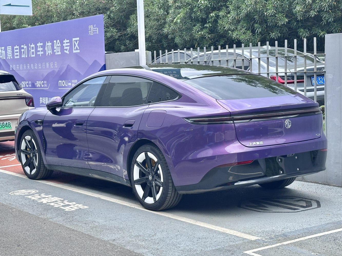 Sleek rear design with continuous tail light and stylish alloy wheels