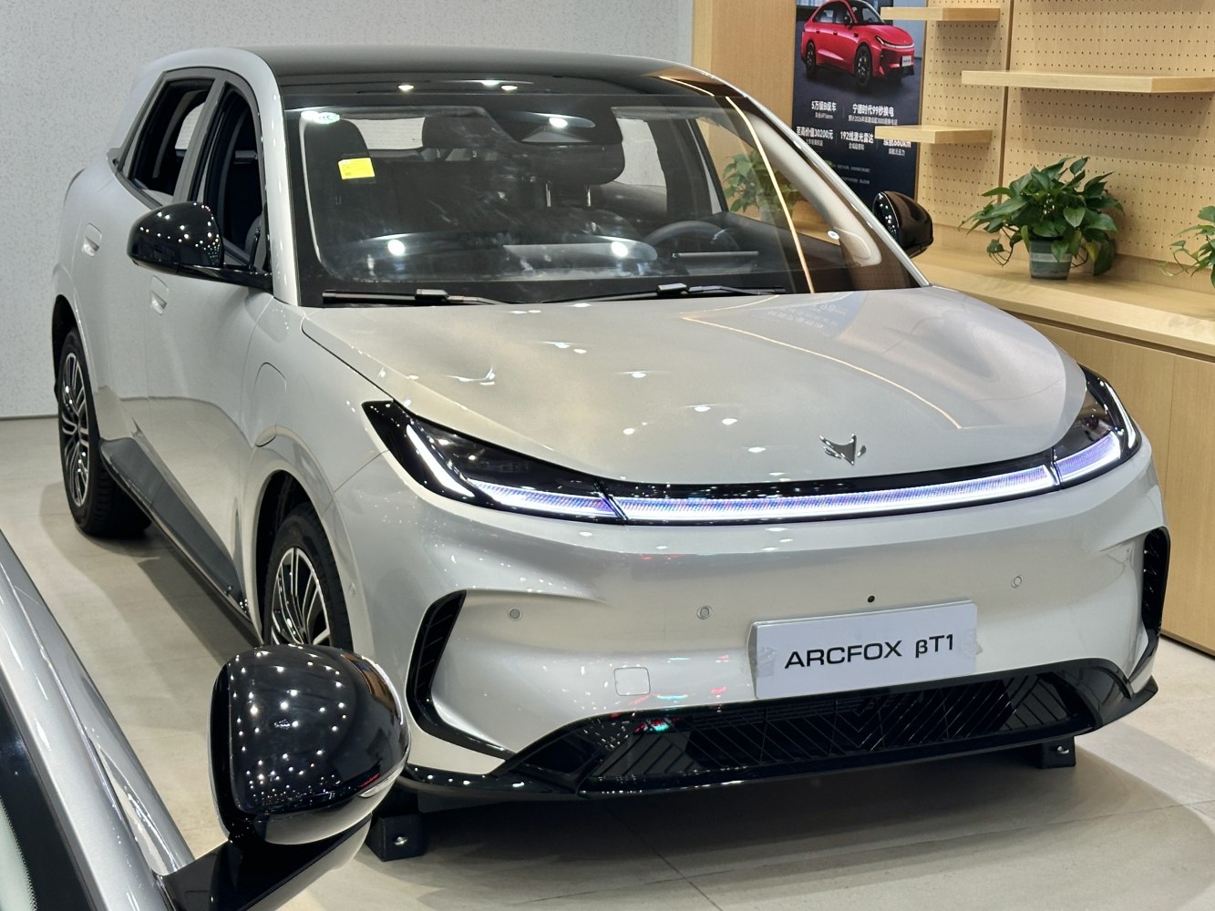 Front view with sleek LED headlights and aerodynamic design