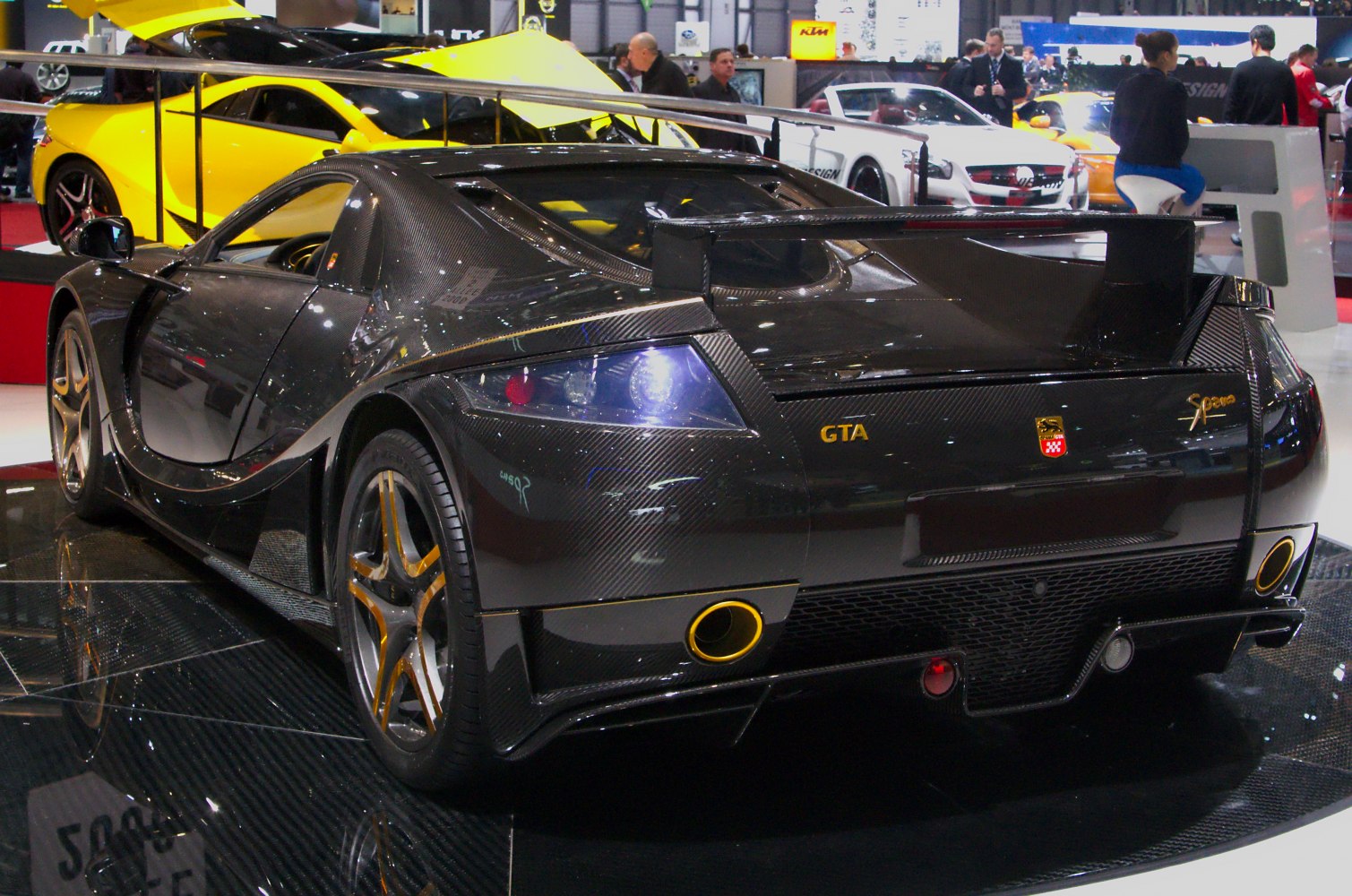 Carbon fiber rear with sharp rear spoiler and performance design elements