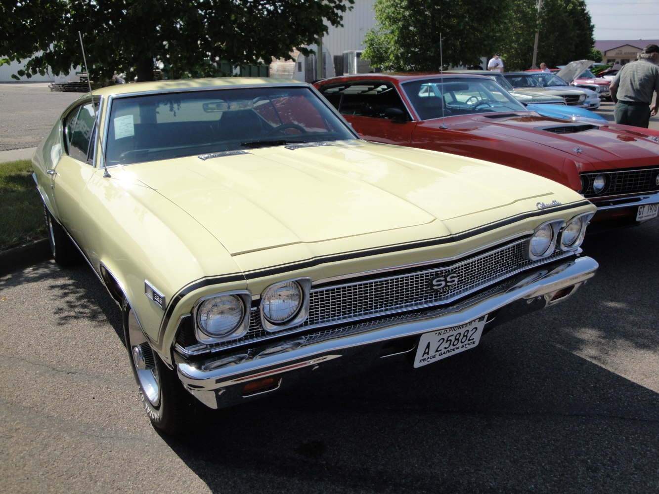 Front grille and dual round headlights of a 1968 muscle coupe